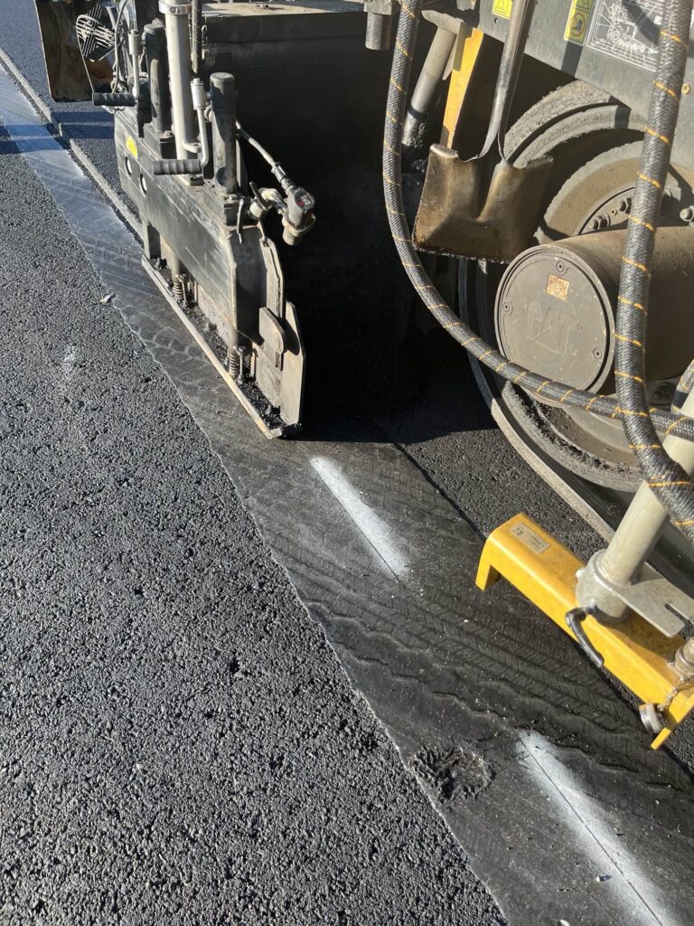 Close up of a road being paving