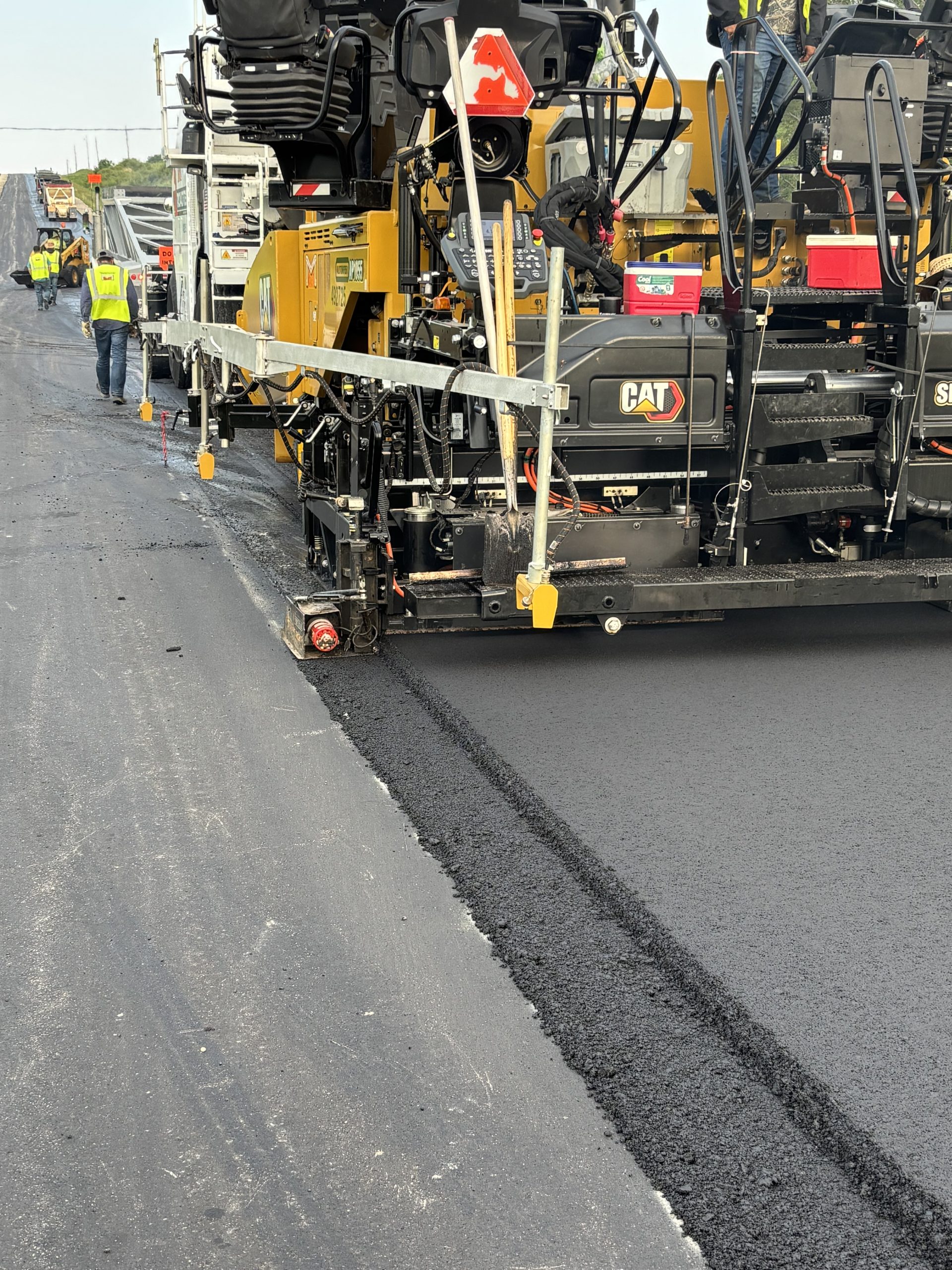 Paving a notched-wedge joint for traffic safety and reinforcing with VRAM